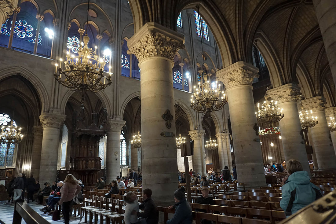 Interior of the Notre Dame in Paris, France decorated for Christmas