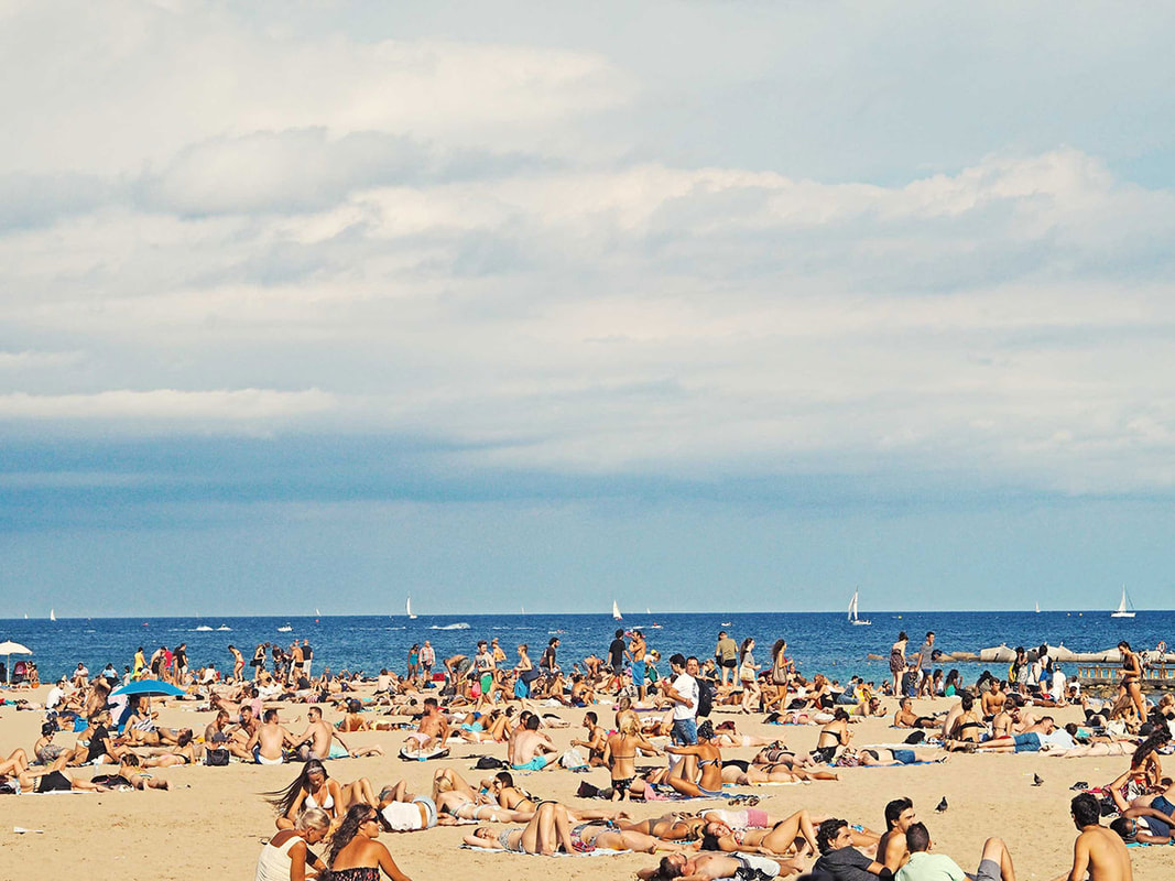 Beach in Barcelona, Spain, filled with tourists